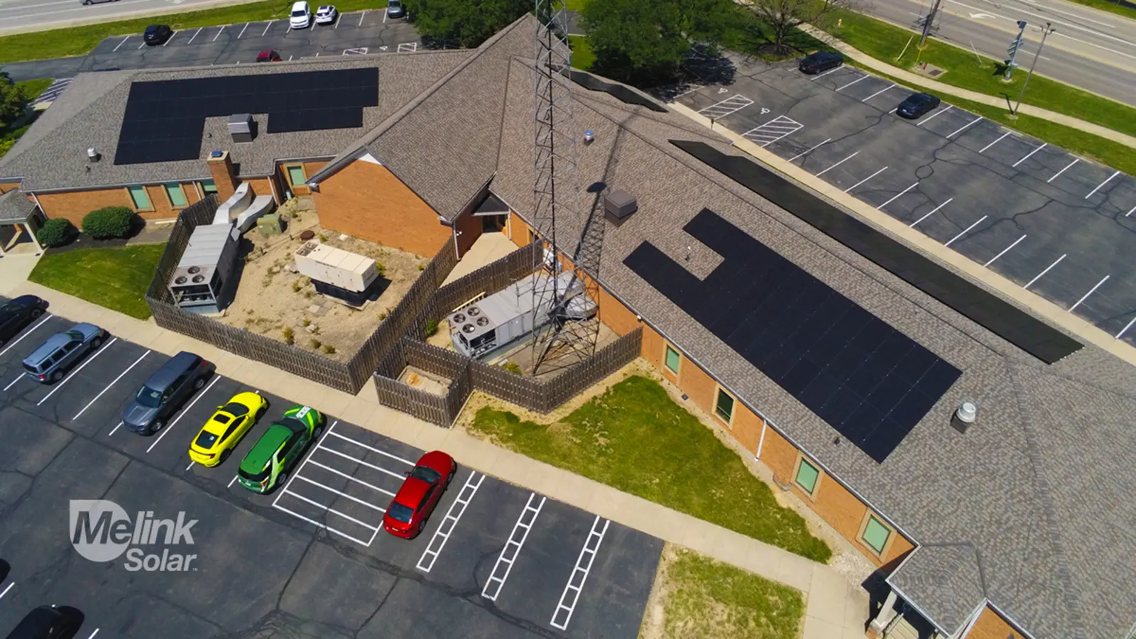 Aerial view of Melink Solar rooftop solar panel array on West Chester Township's Administrative Building